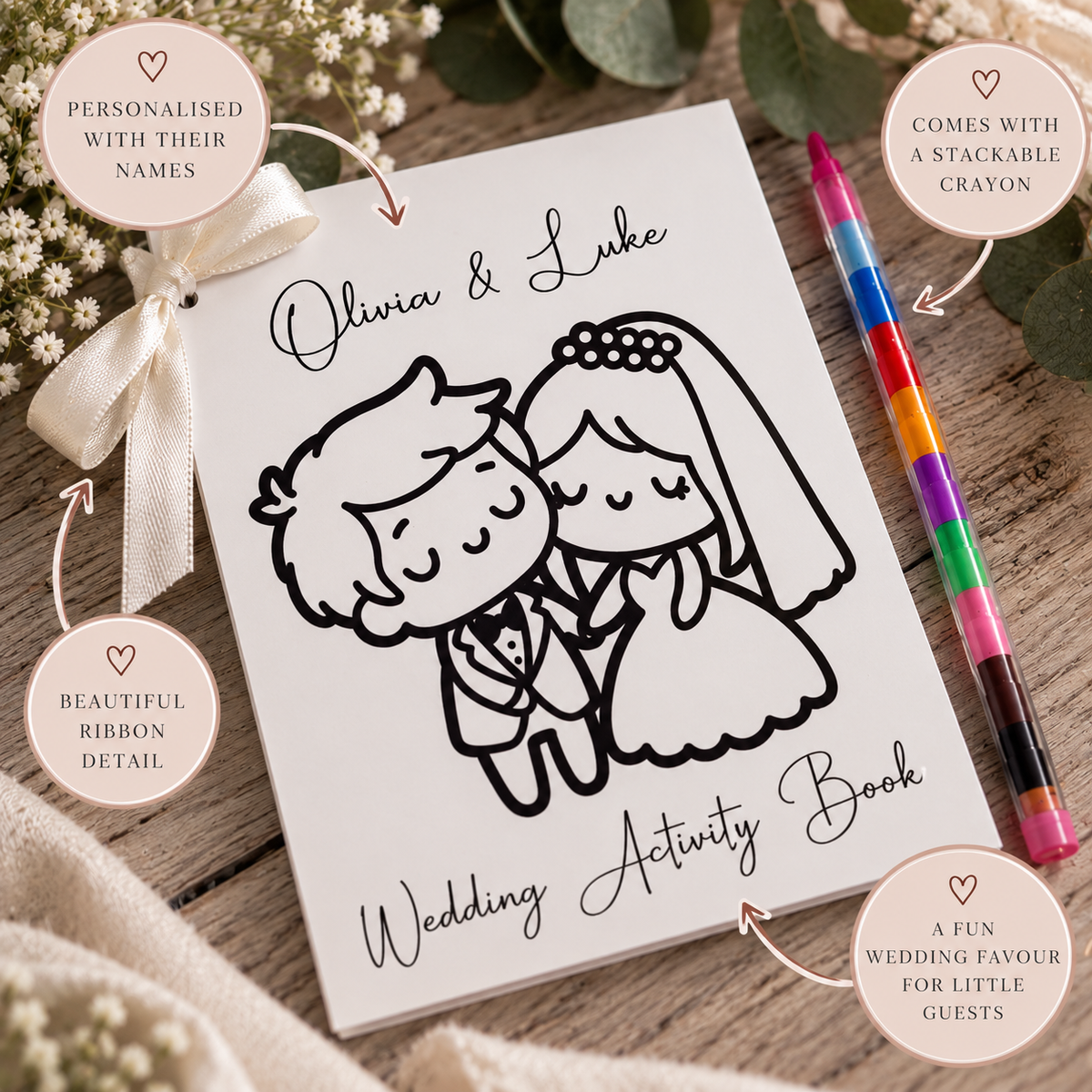 Close up of personalised children's wedding activity book with ribbon and stackable crayon